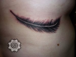 feather tattoo - modern tattoo - black and grey - suku suku tatau