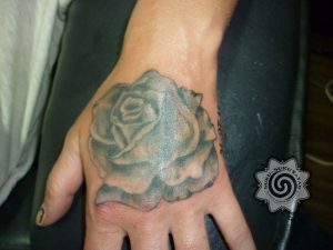 rose tattoo - suku suku tattoo