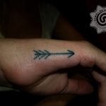 arrow tattoo, hand poking