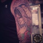 woman tattoo with rose - modern tattoo - suku suku tatau